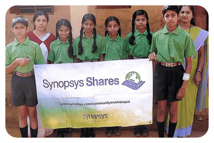 Students of Sujyothi English Medium School, Birunani, thank the corporate donor, arranged by KESST, for their gift of laptops to the school.