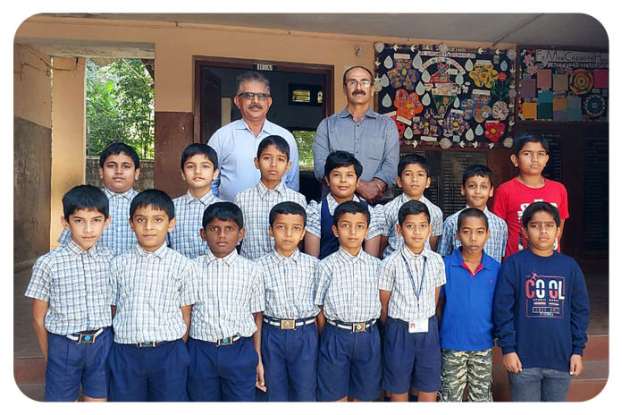 KESST  |  Children from KESST's Sainik School Entrance Examination Coaching Class with Trustees Marchanda Ganesh Ponnappa and Pattada Dhanu Uthaiah.