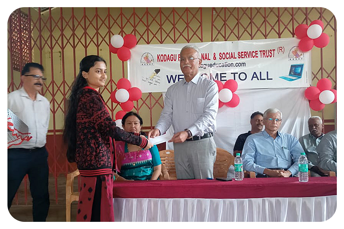 KESST  |  Mandapanda Sada Chengappa, President presenting assistance cheque.